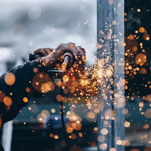 Worker constructing with metal