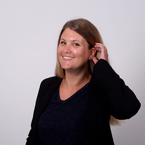 Becky Hayes - Portrait image with grey background