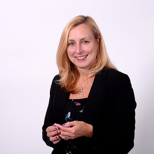 Michelle Willcock - Headshot image with grey background