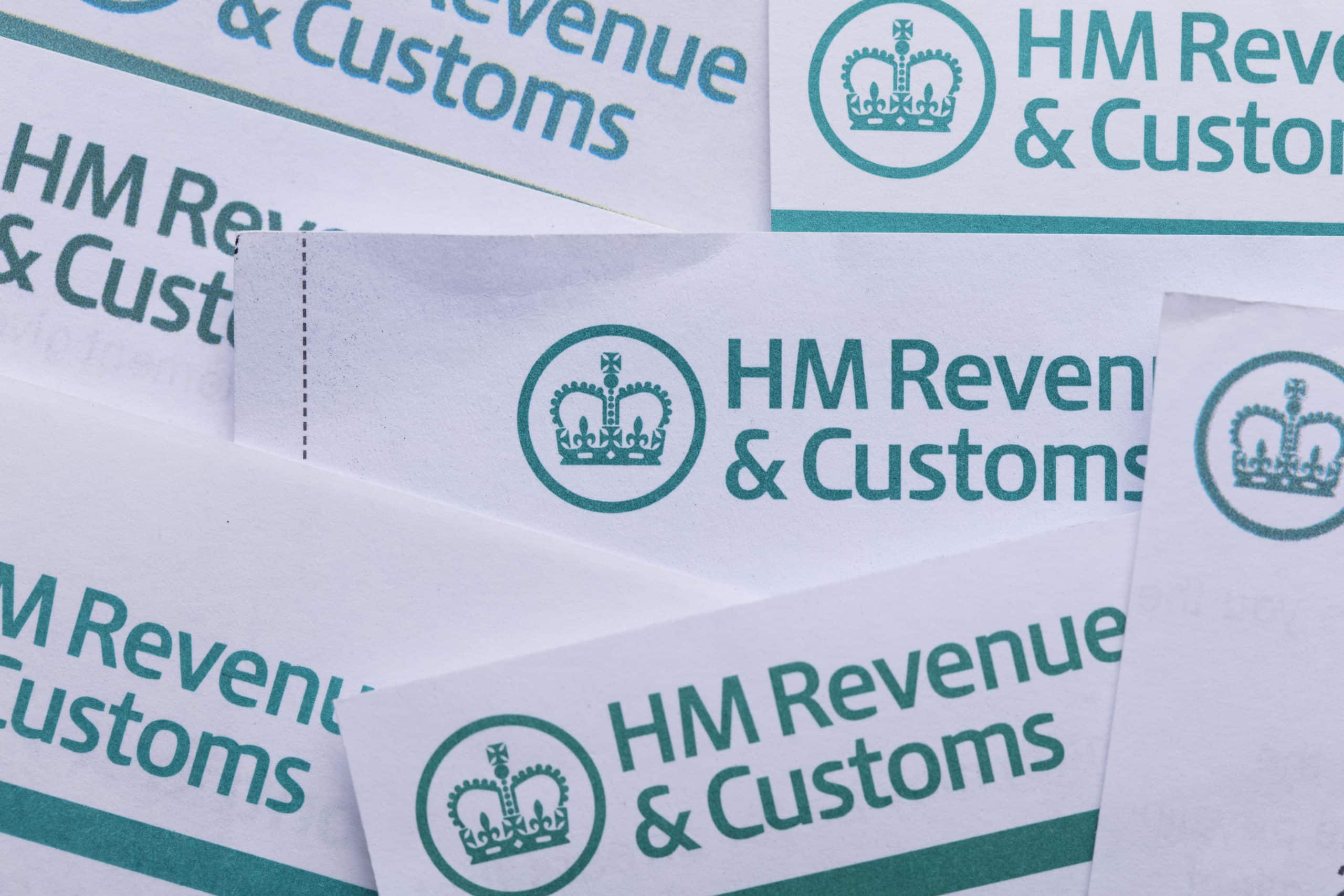 A number of paper documents, each with an HMRC header.