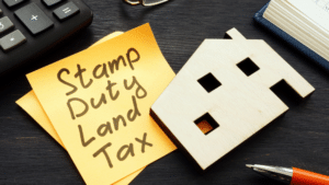 A posted note which has the words Stamp Duty Land Tax (SDLT) on it.